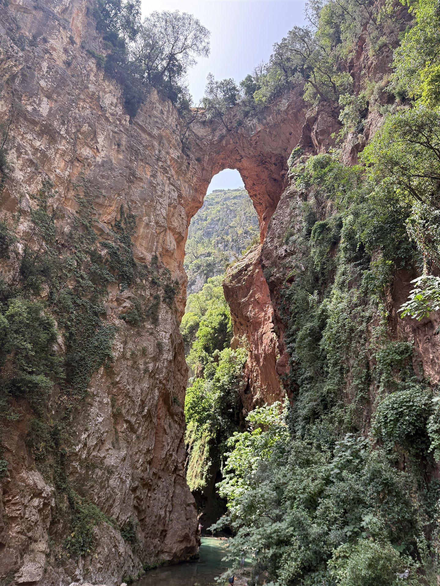 God’s Bridge, a vast natural rock arch above the Akchour river gorge